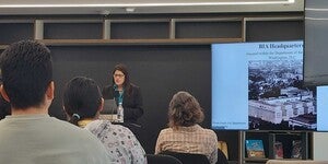 Photo of Dr. Valerie Lambert presenting in front of audience for the Annual Labriola Center Book Award