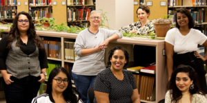 The CDA team poses for a portrait in the Music Library on the Tempe campus