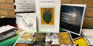 A selection of handmade zines displayed on a table