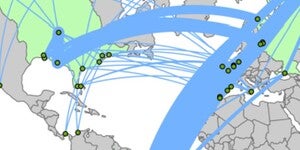 A map of the world with all countries in grey, except for the United States, Brazil, and Russia- which are green, There are green dots indicating major distribution points with blue lines showing the connection between the them visualizing the shipment of chemical fertilizers. 