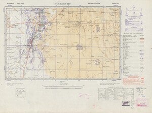 A Topographic map of the deserts in Algeria to be used by the allies in the second world war. It has grid markings in purple and a very expansive legend on the right-hand margins.