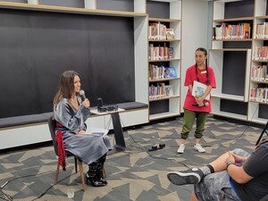 Chelsea T. Hicks (Osage) and Yitazba Largo-Anderson (Diné) welcoming audience to Labriola's Open Mic.