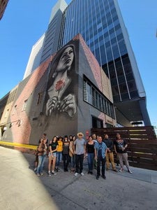 Photo of partipants for the mural walk in front of Thomas Breeze Marcus' second mural.