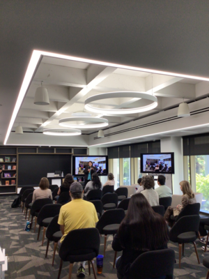 Photo of Dr. Valerie Lambert presenting in front of audience for the Annual Labriola Center Book Award