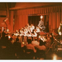  Men singing in choir performance from a distance