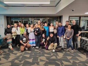 Large group of people posing for a photo