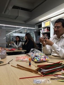 students at the Labriola Center creating xmas cards and decorations