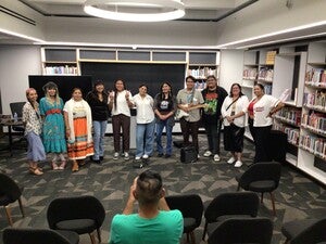 From left to right: Yitazba Largo-Anderson, Jalen Charley, Kianna Joe, KaLynn Yazzie, Kinsale Drake, Lindsey Curley, Eli Shepherd, Nataani Hanley-Moraga, and poets who volunteered to read.