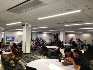 New and Transfer ASU Indigenous students from various tribes in SPIRIT program gathered together chatting in room 236 in Hayden Library, Labriola Center