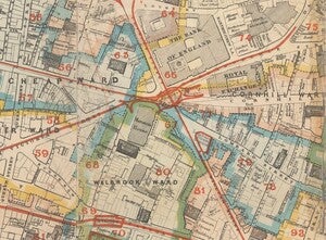 Intersection of five rail lines depicted under a street level intersection on the boundary of five different wards