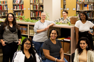 The CDA team poses for a portrait in the Music Library on the Tempe campus