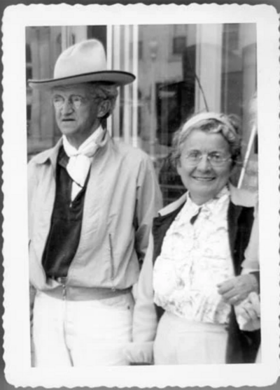 Black and white photo of Fred Wilson sporting a white cowboy hat with his wife, Ruth Wilson. 