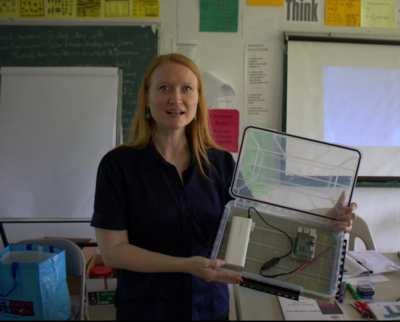 ASU faculty Laura Hosman displays her research on solar-powered digital libraries